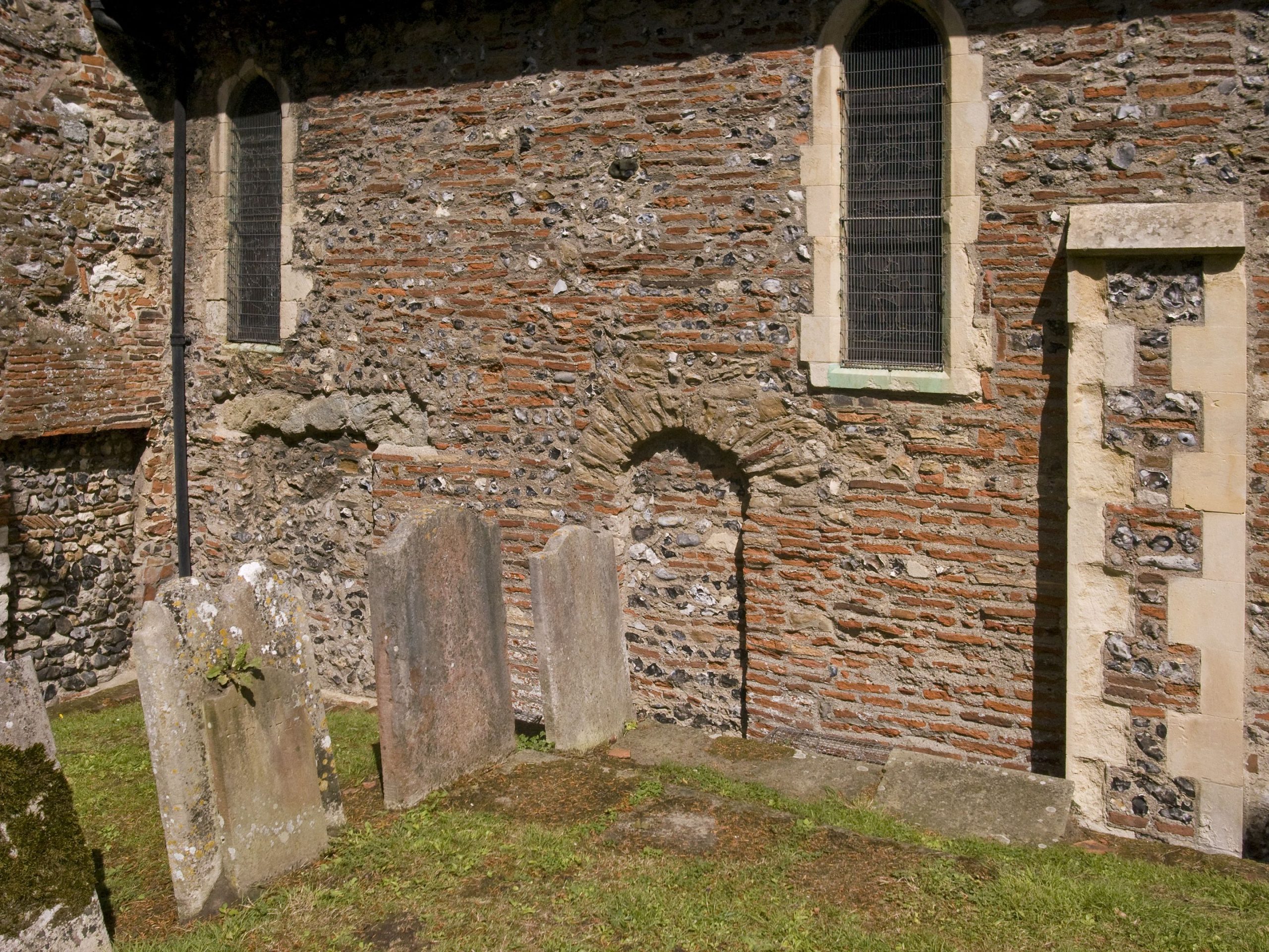 Part of the south wall of the chancel of St Martin's Church, Canterbury, England. Built with Roman bricks.