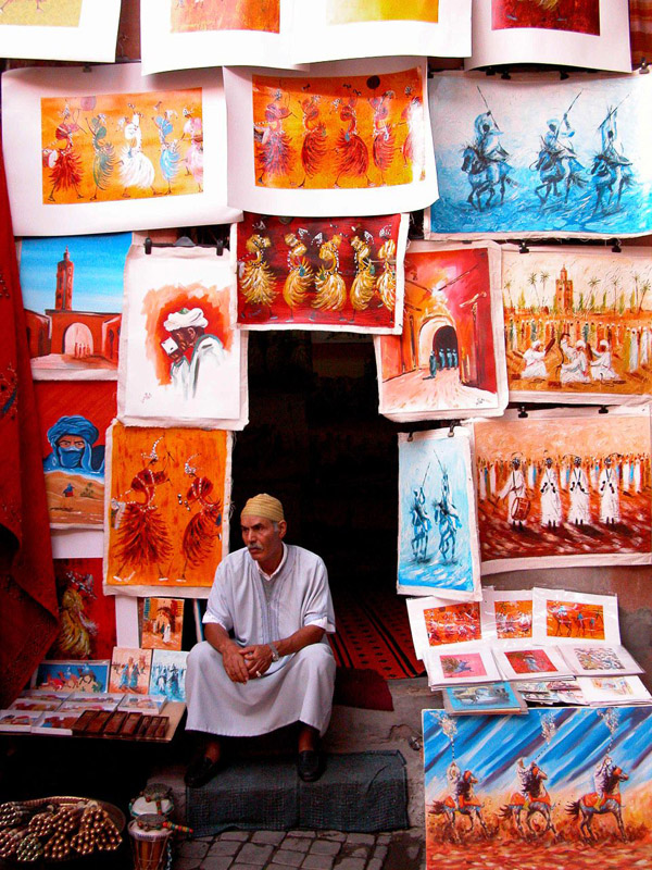 Marrakech market vendor selling artwork depicting the Moors. Notice NOT one is caucasian.